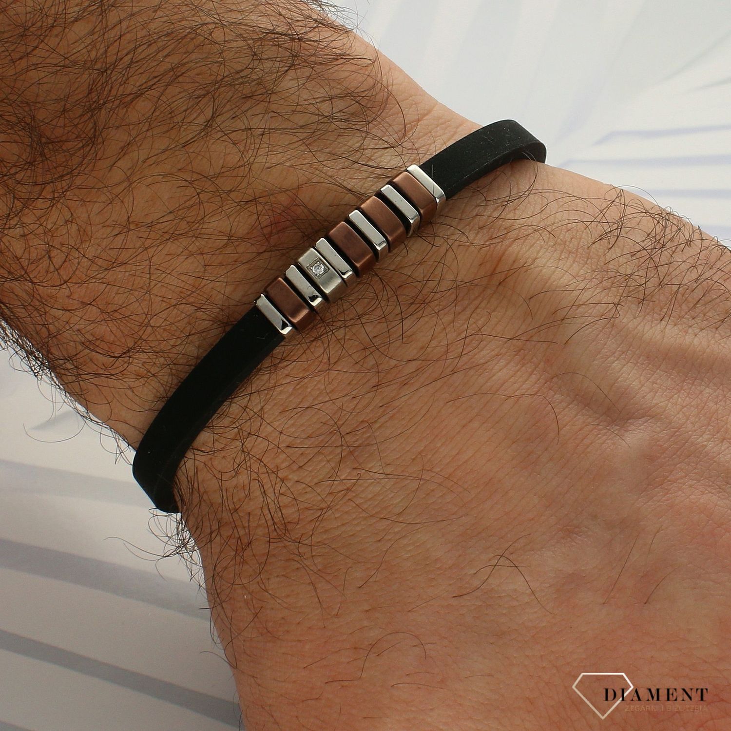 Bransoletka męska Nomination kauczuk z białą cyrkonią z kolekcji CIty 028804 028 z brązowymi elementami. Bransoletka w kolorze czarnym wykonana z kauczuku i stali szlachetnej 316L..jpg